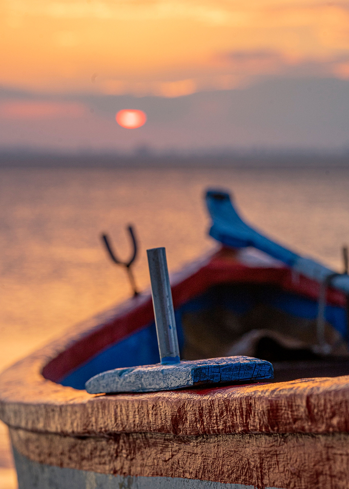 Fishing boat at sunset
