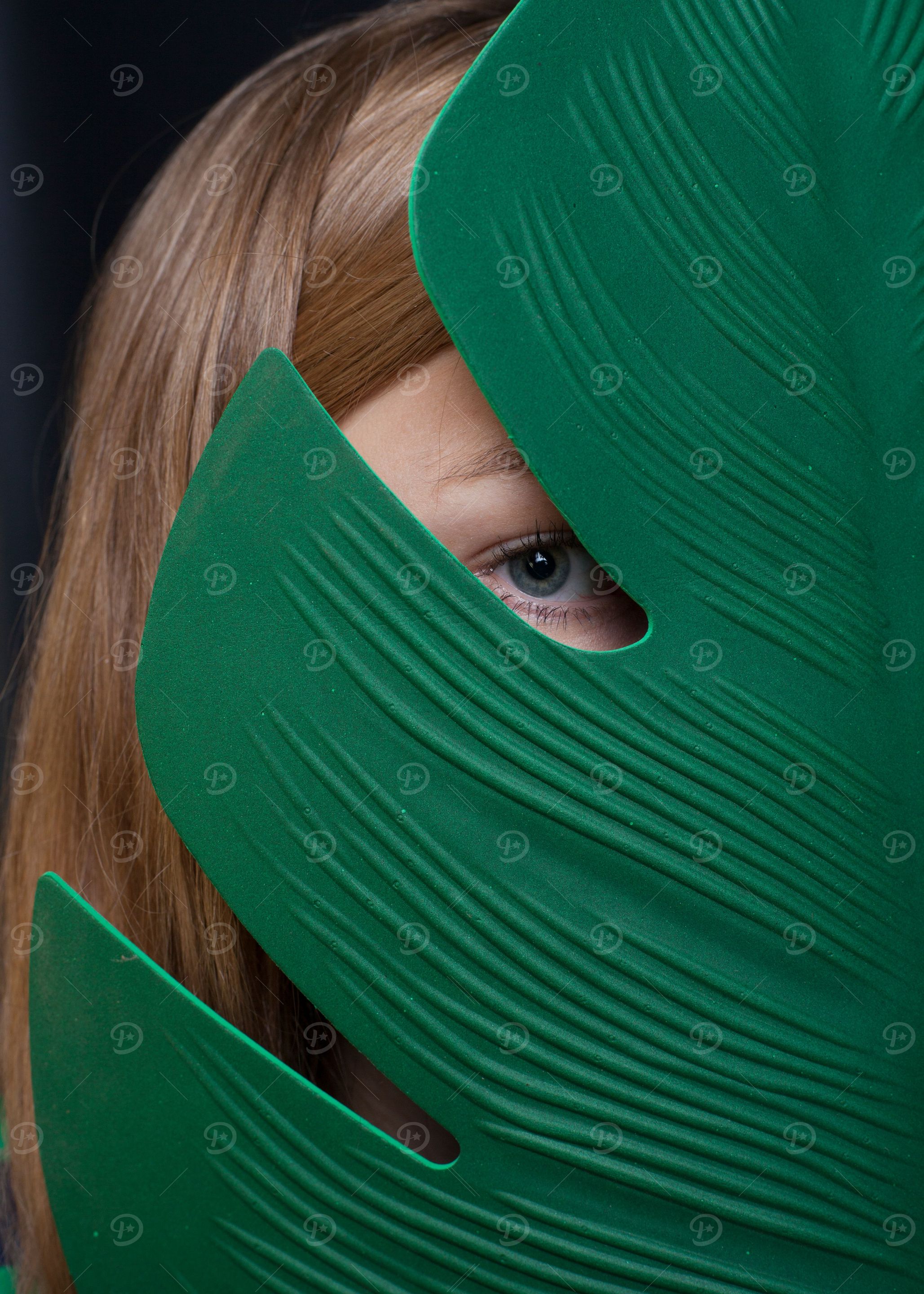 girl with a green leaf