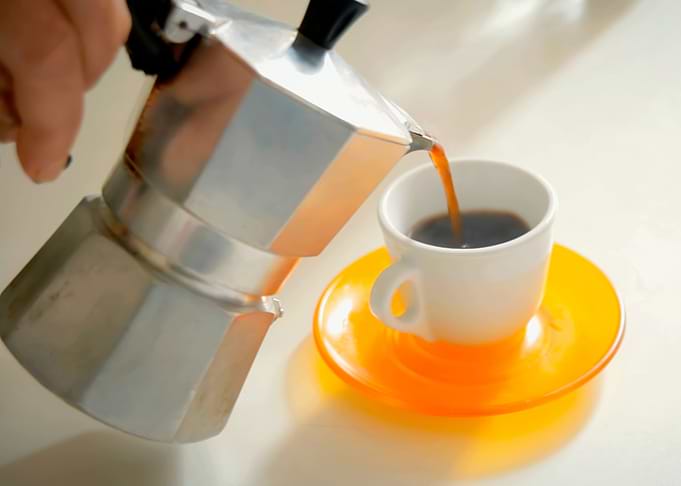 Coffee in cup morning hand
