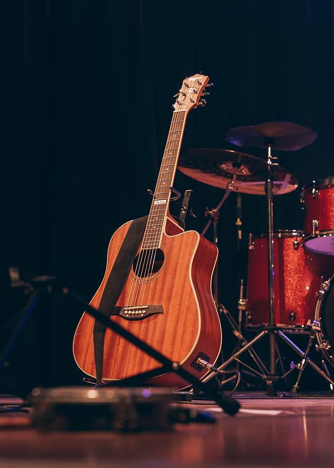 brown guitar sand