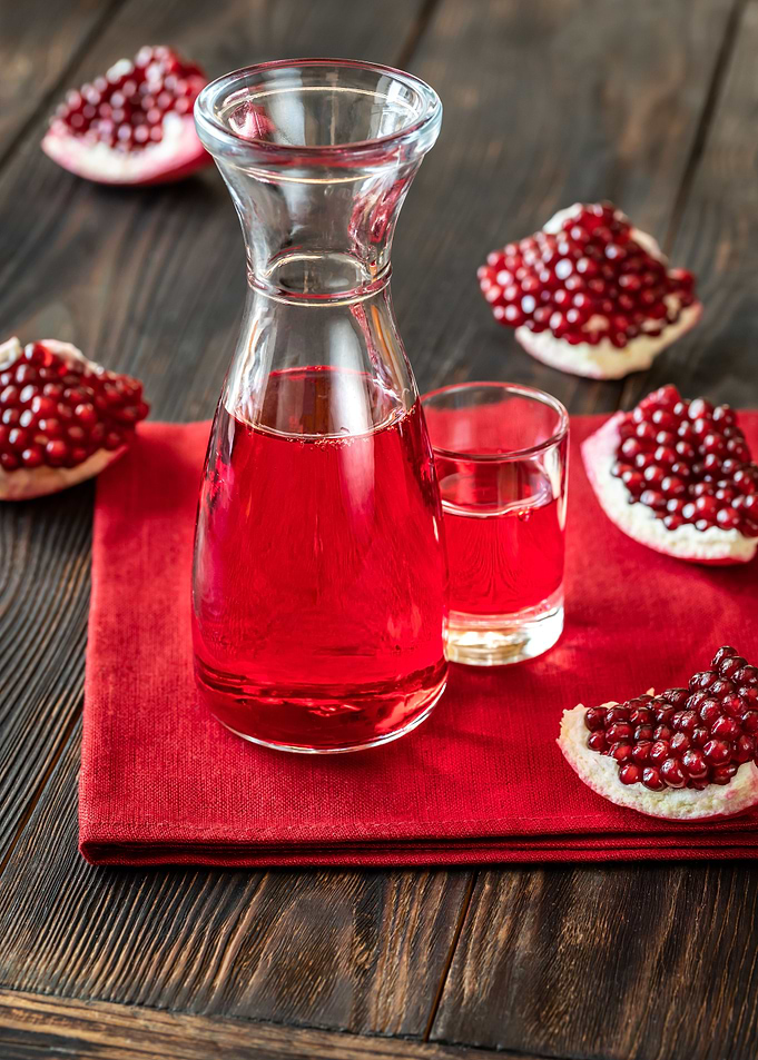 Glass jug of grenadine syr