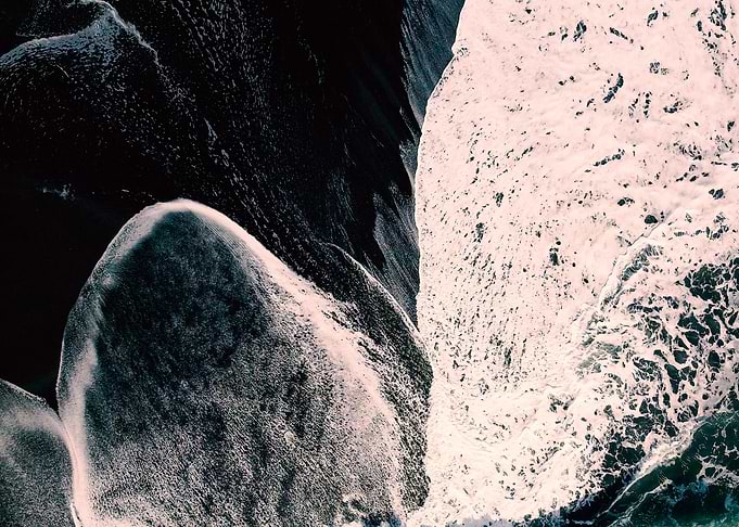 Black sand beach tide