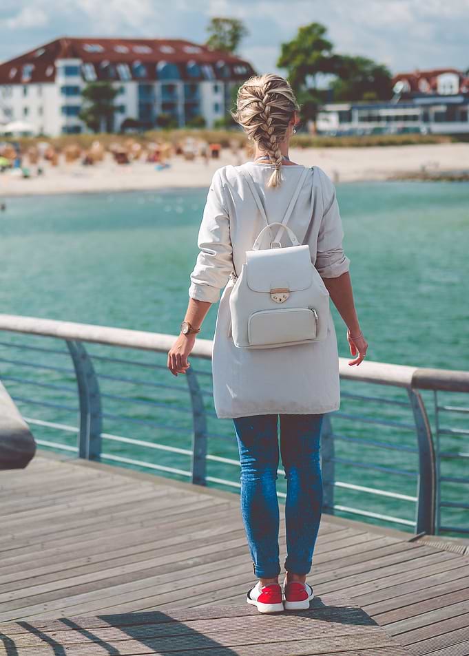 Woomen On Pier Near Beach