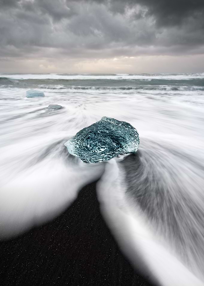 Ice block at black beach