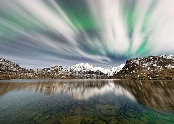 Northern lights and clouds
