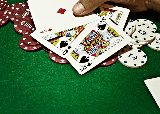 Showing cards green table