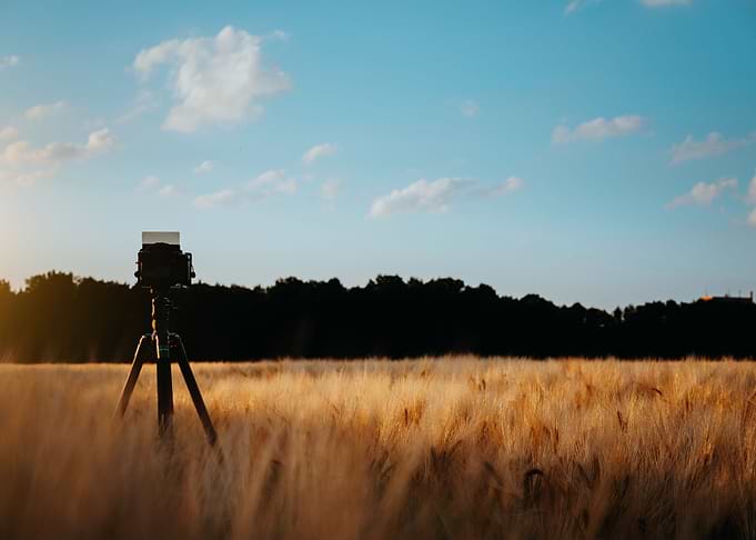 Camera On Tripod Capturing