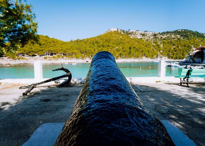 Cannon And Anchor On Coast