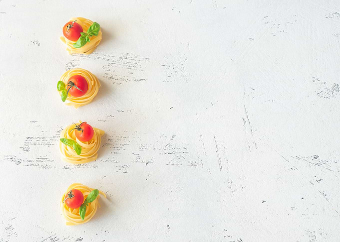 Raw fettuccine with tomato