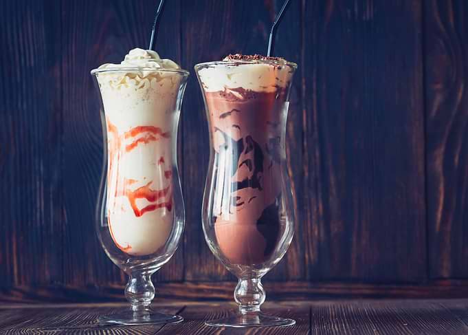 Two glasses of milkshake