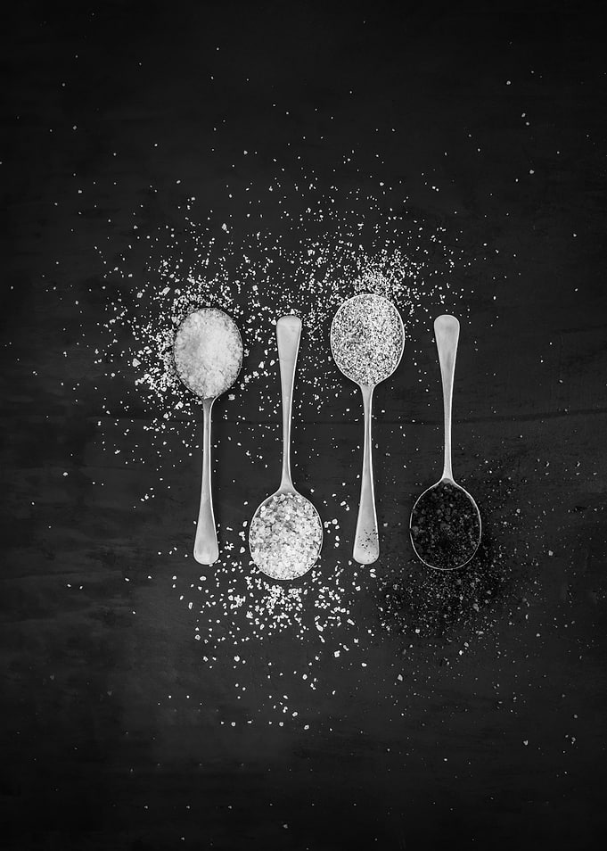 Spices on silver spoons