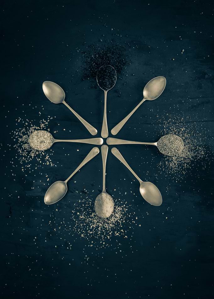 Spices on silver spoons