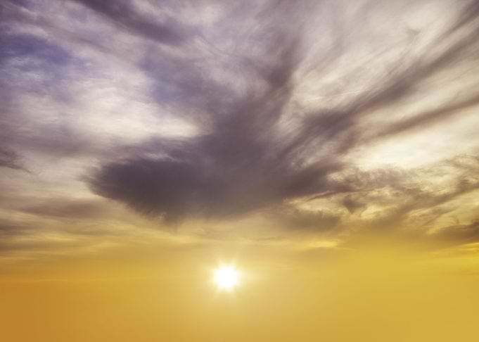 Yellow sky with clouds