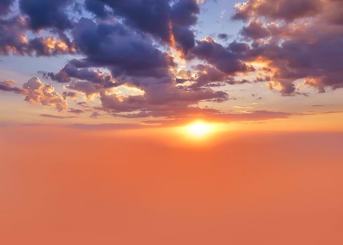 Orange sky with sun