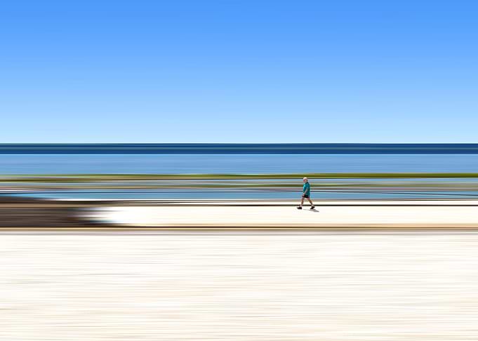Man walking along river