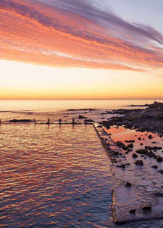 Reflections in dawn sea
