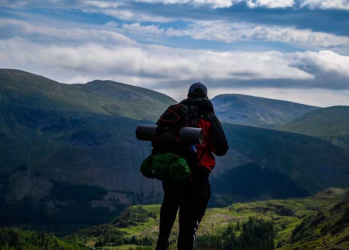 Person On Top Of Mountain