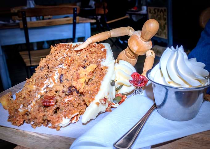 Manikin eating cake