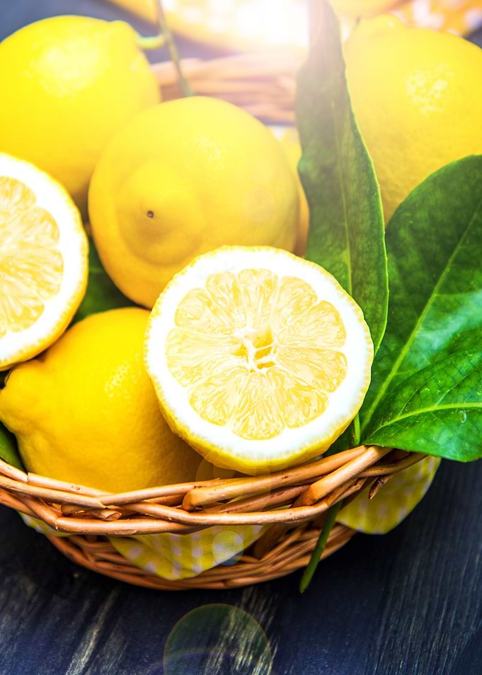 lemon with green leaf