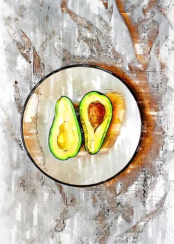 Two Split Avocados In Bowl