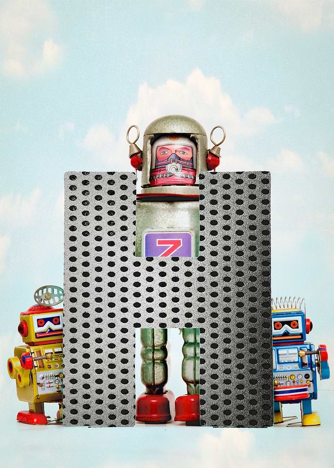 Big letter H retro robots