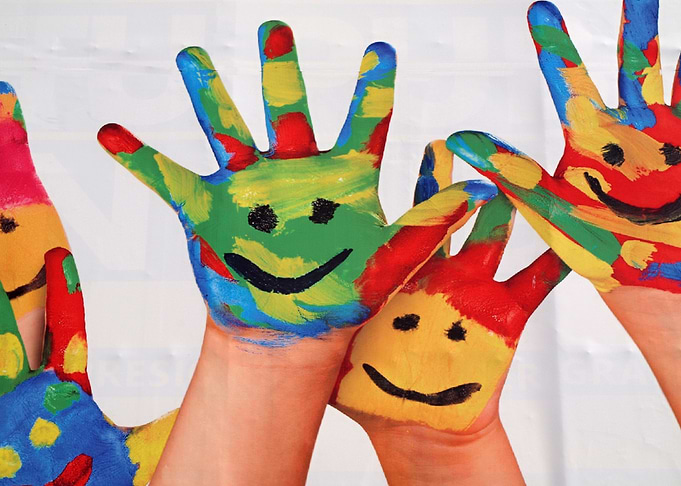 Colored hands with smily