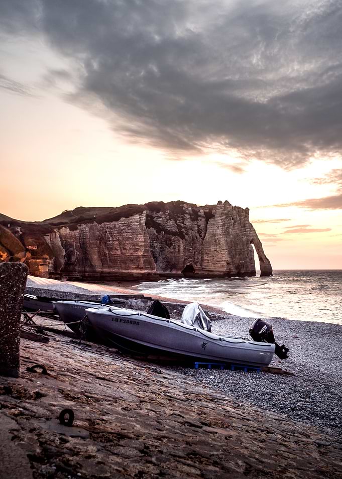 Boat in front of the cliff
