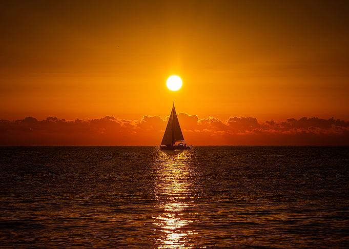 Sailboat sunrise landscape
