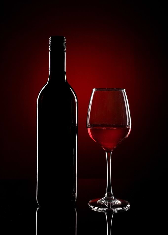 A Wine Bottle and Glass