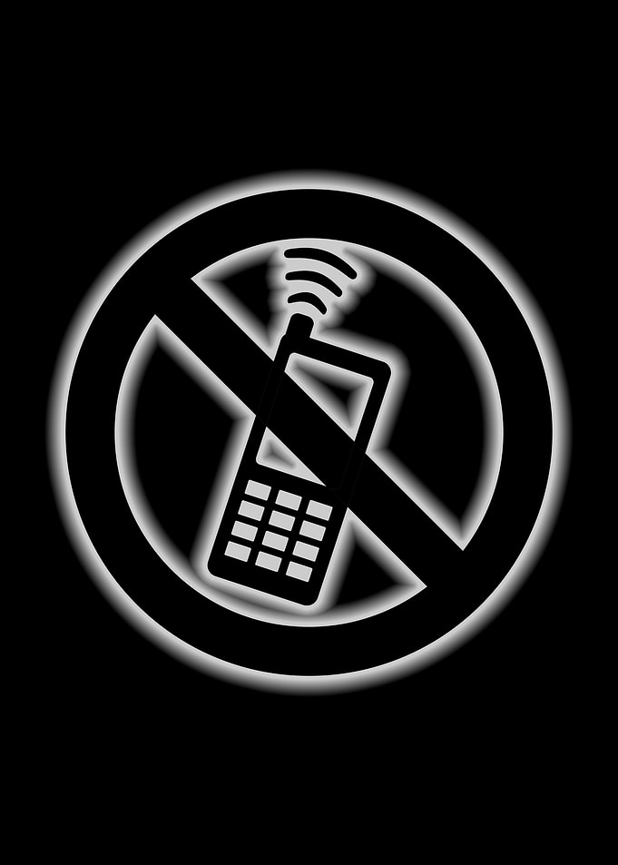 no mobile phones sign glow