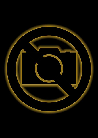 no photography sign gold