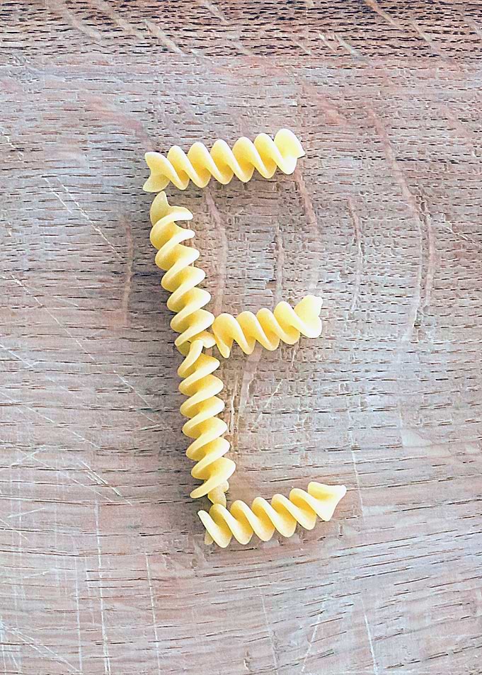 Letter composed with pasta