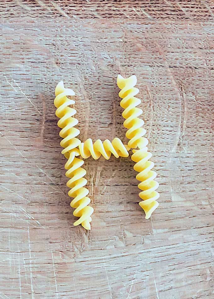 Letter composed with pasta