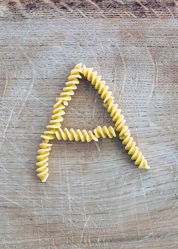 Letter composed with pasta