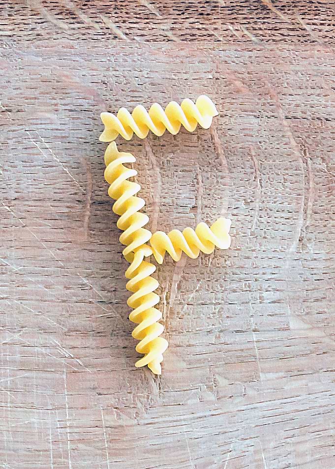 Letter composed with pasta