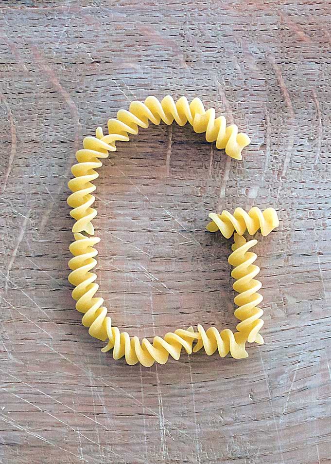 Letter composed with pasta