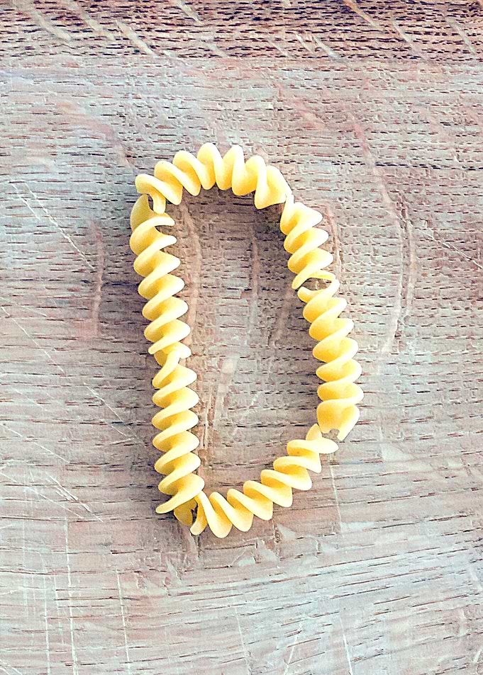 Letter composed with pasta