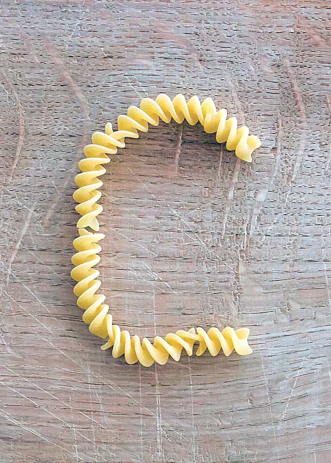 Letter composed with pasta