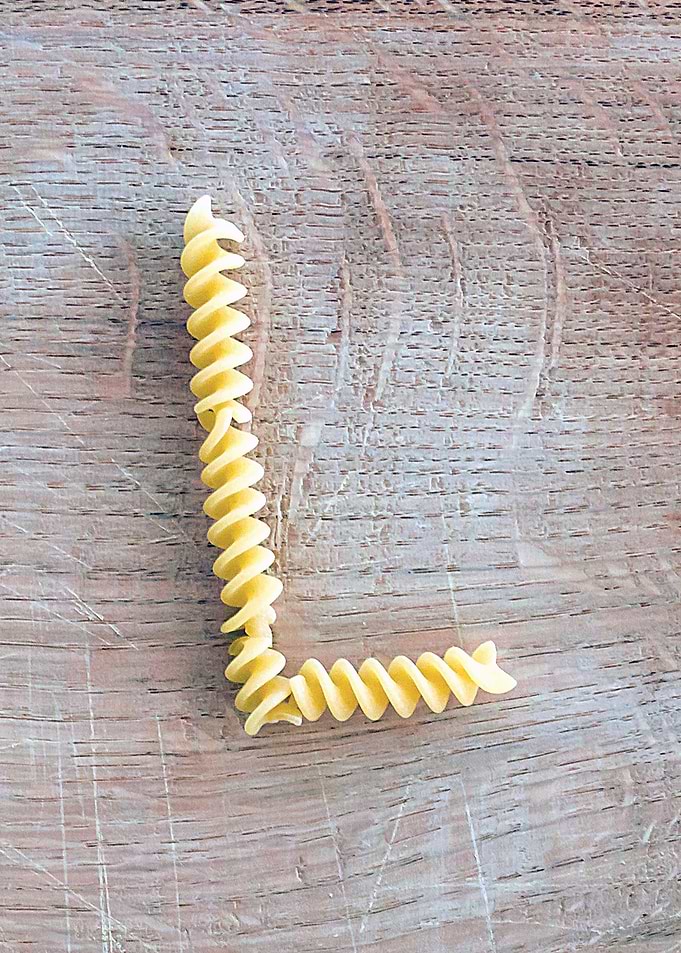 Letter composed with pasta