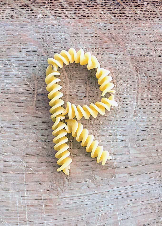 Letter composed with pasta