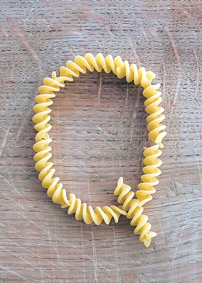 Letter composed with pasta