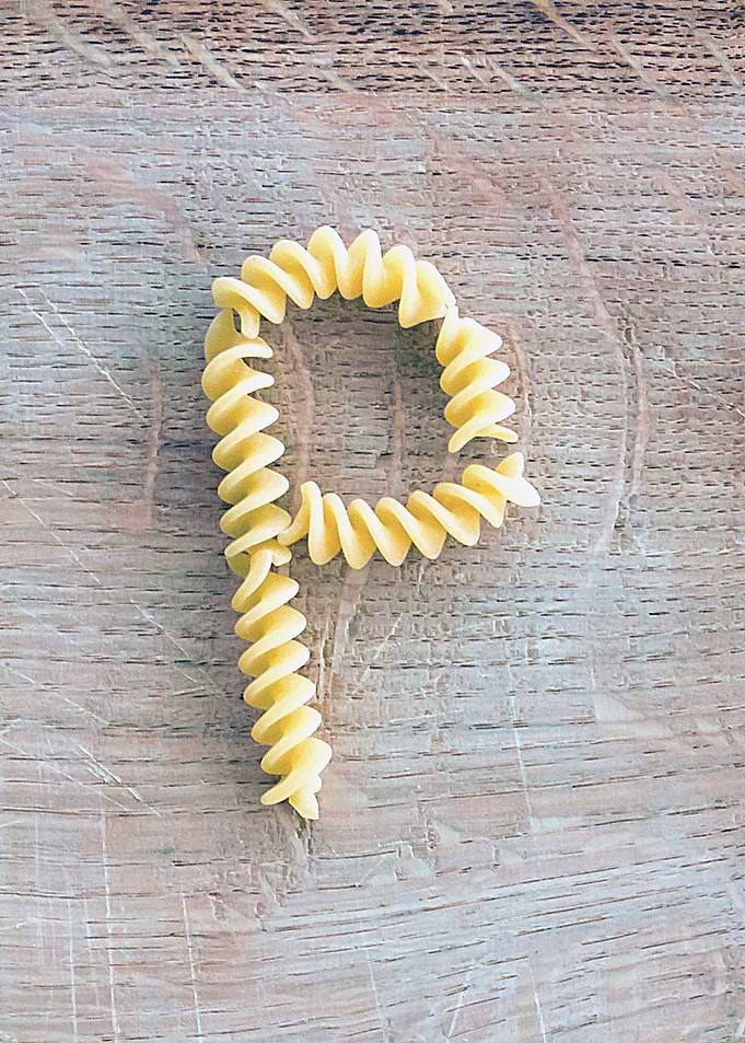 Letter composed with pasta