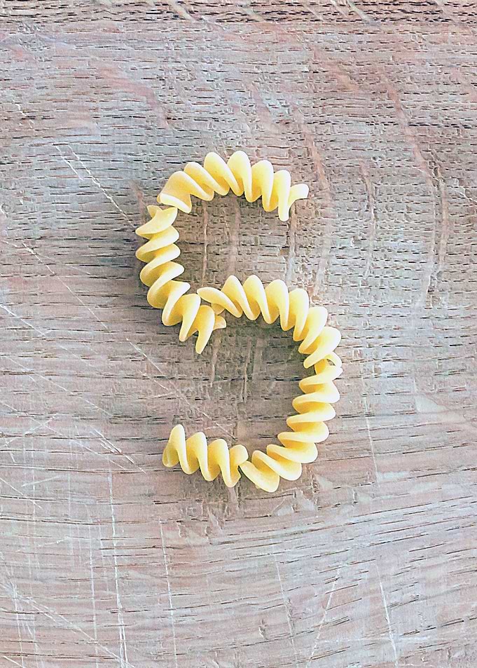Letter composed with pasta