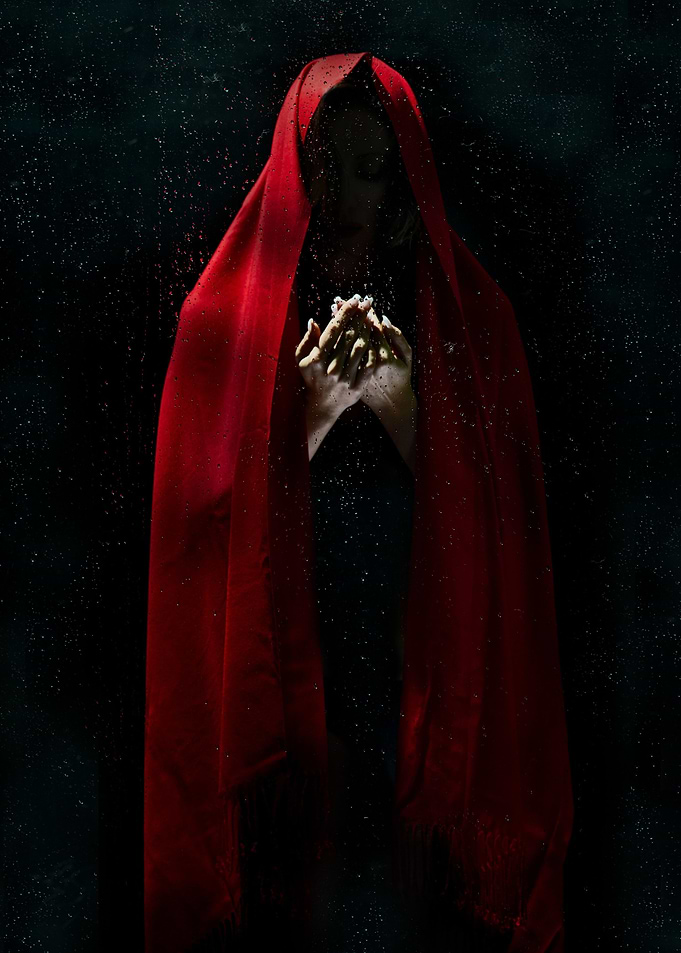 Women in a red Cape