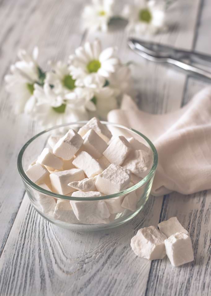 Bowl of white lump sugar