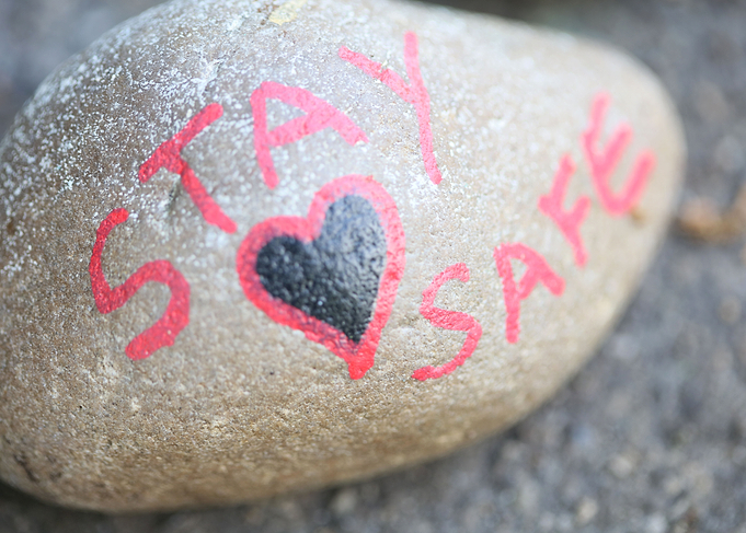 Kids drawing on stones