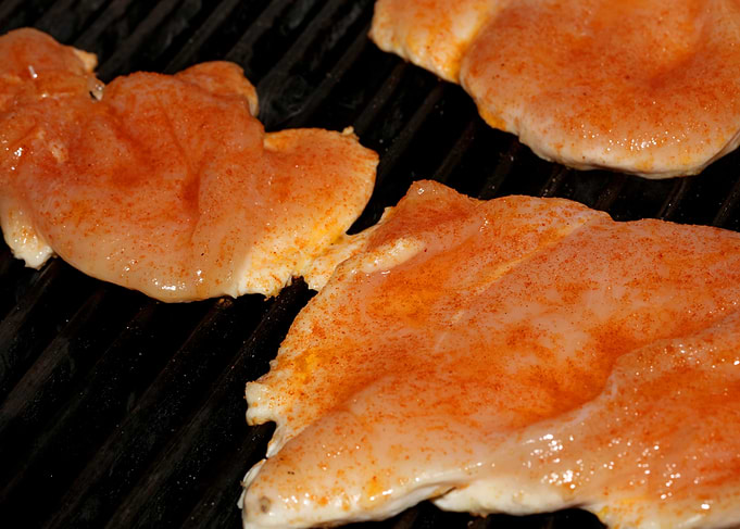 Meat baking on Greek grill
