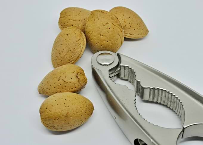 Almonds with nutcracker