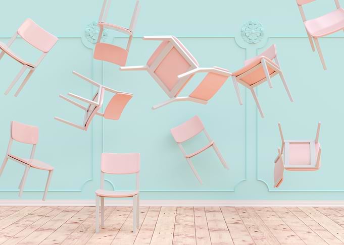 Flying chairs in a room