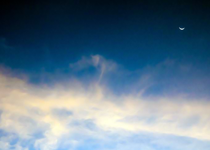 Sunbeam behind dark clouds
